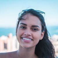 Woman with turquoise sky backdrop